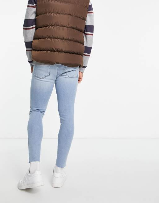 ASOS DESIGN - Jean effet seconde peau en tissu power stretch à délavage moyen avec ourlet brut, 2 de 4