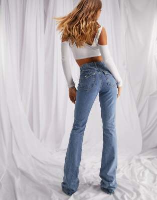 ASOS DESIGN - Jean évasé en coton mélangé avec poches - Bleu moyen délavé - MBLUE | ASOS