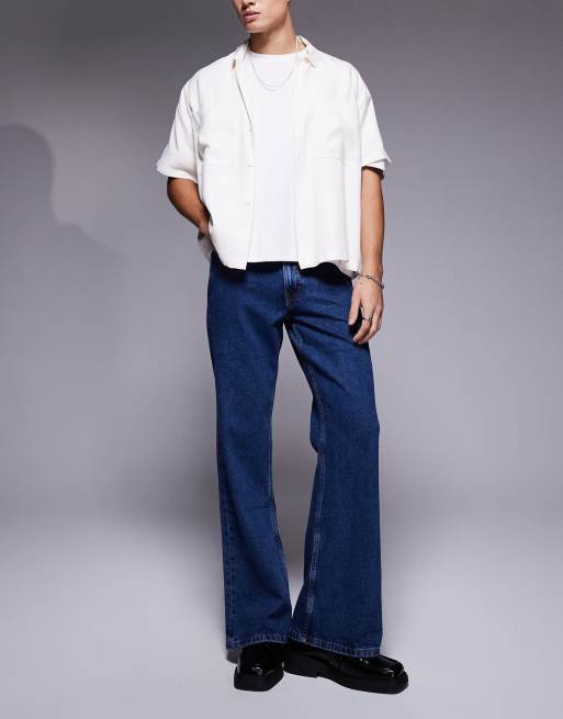 ASOS DESIGN - Jean évasé style vintage - Bleu foncé délavé