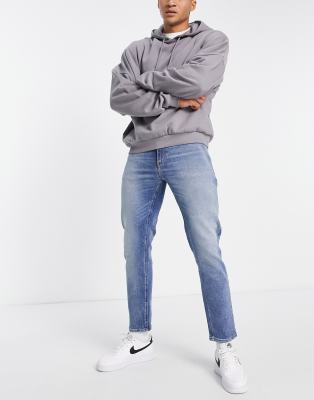 ASOS DESIGN - Jean fuselé stretch - Délavage moyen
