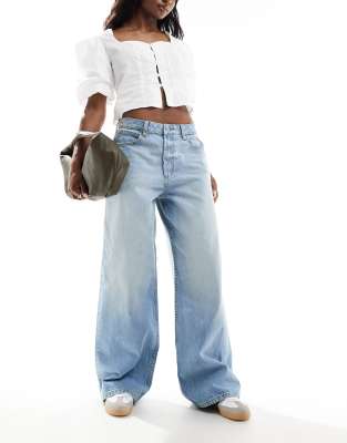 ASOS DESIGN wide leg jean in mid blue - ASOS Price Checker