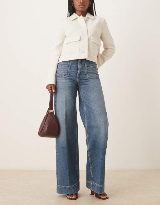 ASOS DESIGN - Jean large épuré avec poches et plis sur l'avant - Bleu vintage délavé