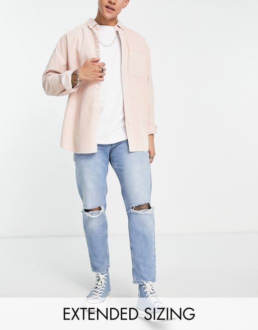 ASOS DESIGN - Jean rigide classique avec abrasions et déchirures aux genoux - Bleu moyen délavé