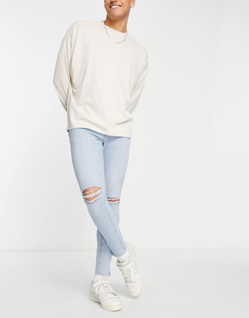ASOS DESIGN - Jean seconde peau en tissu power stretch avec déchirures aux genoux et ourlets zippés - Bleu clair délavé, 4 de 4