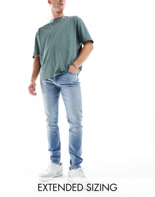 ASOS DESIGN skinny jeans in light wash blue - ASOS Price Checker