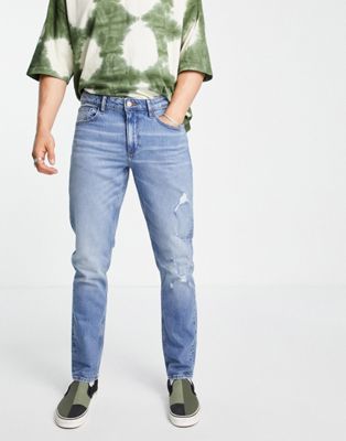 Jeans slim Jean slim effet usé en coton biologique mélangé stretch - Délavage moyen