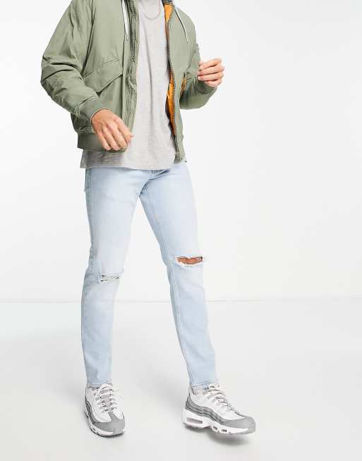 ASOS DESIGN - Jean slim stretch déchiré aux genoux - Délavage clair