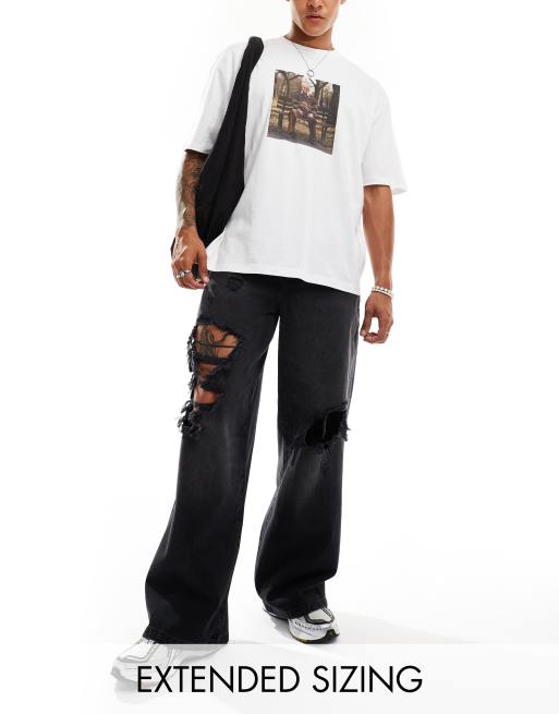 ASOS DESIGN - Jean ultra baggy avec grosses déchirures - Noir délavé