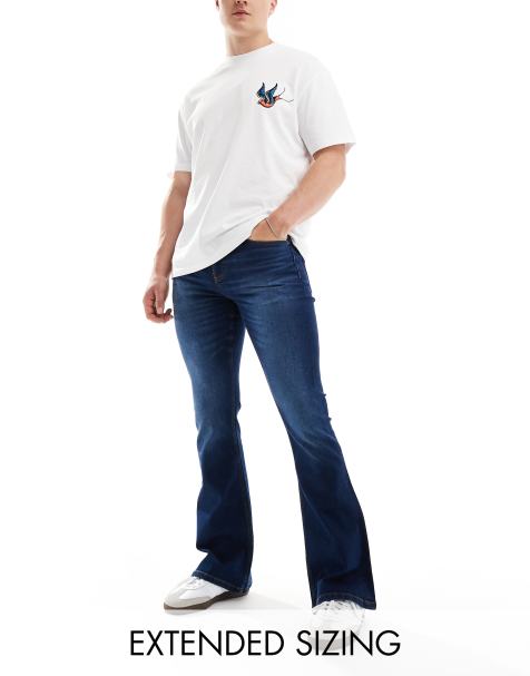 ASOS DESIGN - Jeans a zampa elasticizzati lavaggio blu scuro - view 1