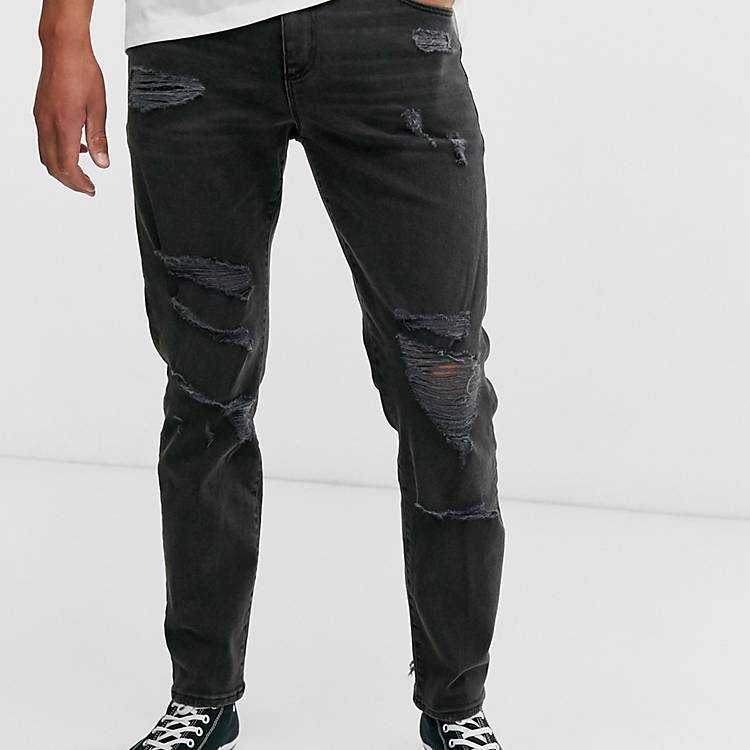 Jeans affusolati slavato con strappi vistosi Asos Uomo Abbigliamento Pantaloni e jeans Jeans Jeans affosulati 