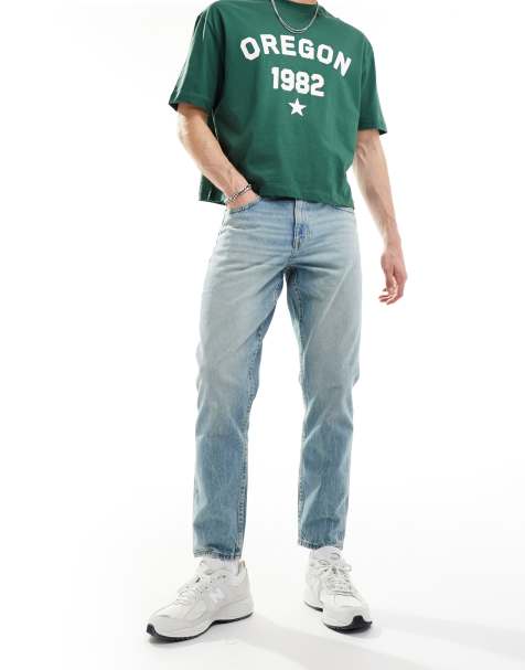 ASOS DESIGN - Jeans affusolati blu lavaggio chiaro con tinta vintage - view 1