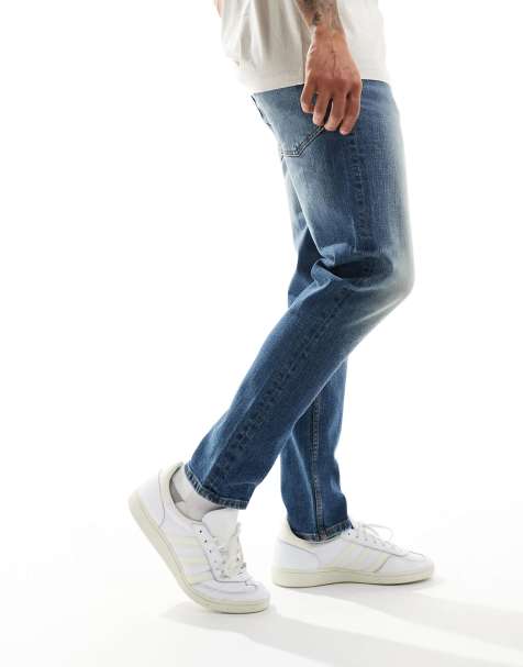 ASOS DESIGN - Jeans affusolati elasticizzati lavaggio blu medio vintage - view 1