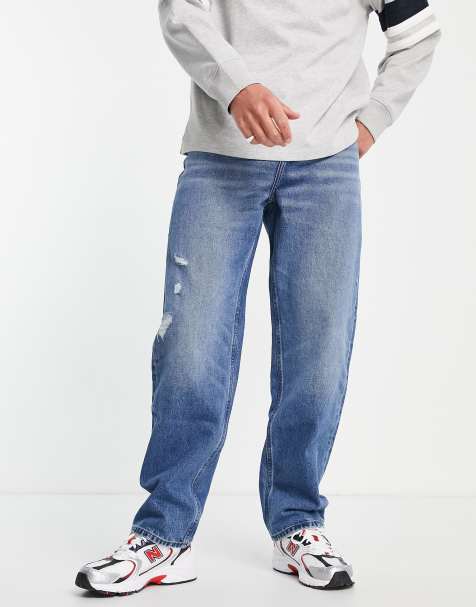 ASOS DESIGN - Jeans ampi lavaggio medio con abrasioni - view 1