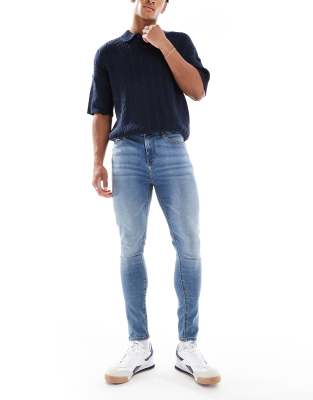 Jeans aus Power-Stretch in verwaschenem Mittelblau Blau 60 Short