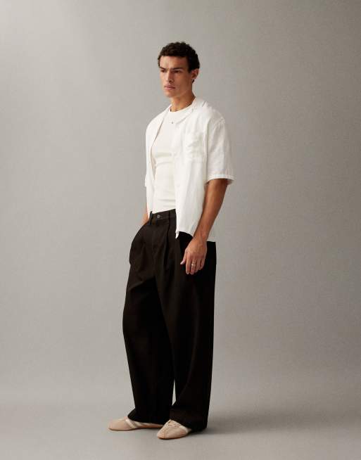 ASOS DESIGN - Jeans bombati marroni con pieghe, 2 di 7