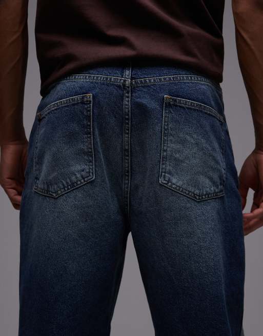ASOS DESIGN - Jeans comodi affusolati in blu slavato, 4 di 5