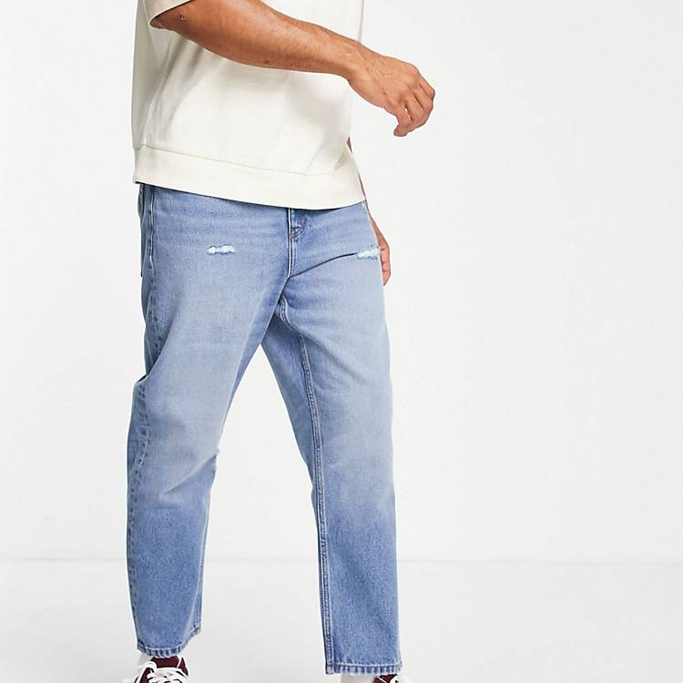 Jeans comodi affusolati lavaggio medio vintage Asos Uomo Abbigliamento Pantaloni e jeans Jeans Jeans affosulati 