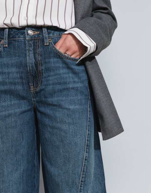 ASOS DESIGN jeans con cucitura attorcigliata e vita regolabile lavaggio medio, 3 di 5