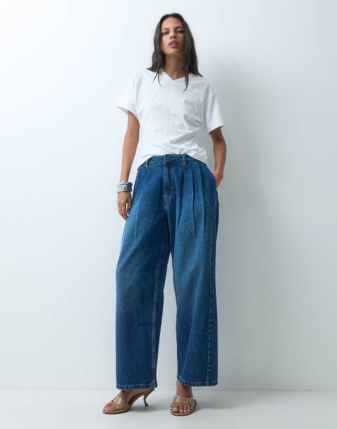 ASOS DESIGN jeans con piega frontale e gamba a ferro di cavallo in blu medio autentico - view 1
