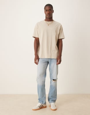 ASOS DESIGN - Jeans dritti lavaggio medio con strappi - view 1