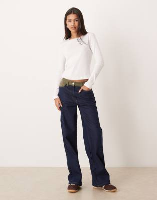 ASOS DESIGN - Jeans in Indigoblau mit weitem Bein und Einsatz aus Cord