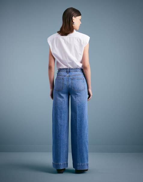 ASOS DESIGN – Jeans in Mittelblau mit hohem Bund, weitem Schnitt und Vordertaschen - view 1