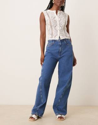 ASOS DESIGN - Jeans in Mittelblau mit weitem Beinschnitt und Nahtdetail, Kombiteil