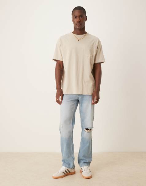 ASOS DESIGN – Jeans in mittlerer Waschung mit geradem Schnitt und Zierrissen - view 1