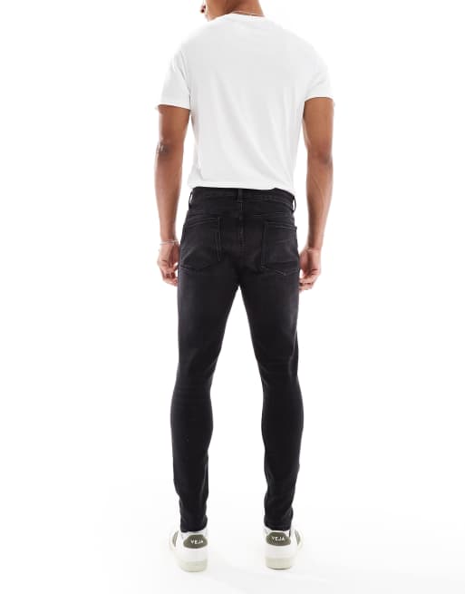 ASOS DESIGN - Jeans in power stretch nero slavato effetto spray, 2 di 5