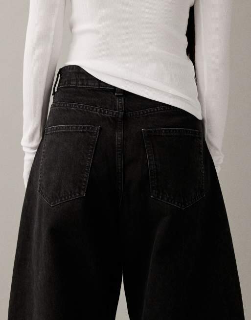 ASOS DESIGN – Jeans in Schwarz mit weitem, abgerundetem Bein und hohem Bund, 4 von 7