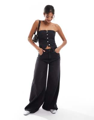 ASOS DESIGN - Jeans in Schwarz mit weitem Bein
