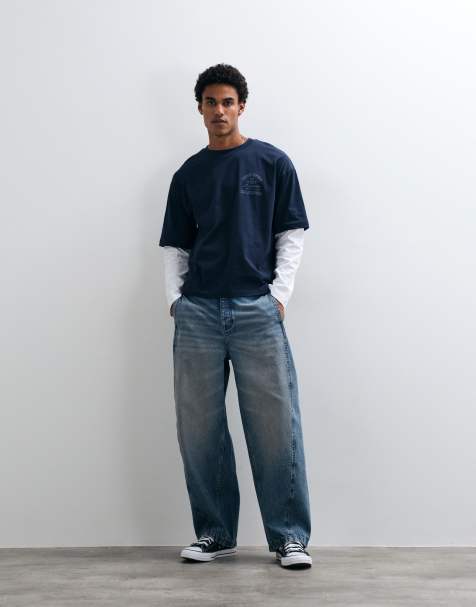 ASOS DESIGN – Jeans in verwaschenem Mittelblau mit abgerundetem Beinschnitt und Ziernaht - view 1