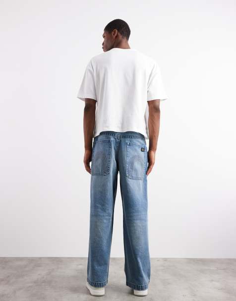 ASOS DESIGN - Jeans med broderet baglomme i lys vask i superposet pasform - view 1