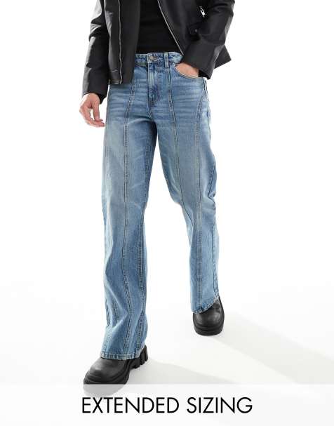 ASOS DESIGN - Jeans med paneldetaljer og svaj i mellemvasket blå - view 1