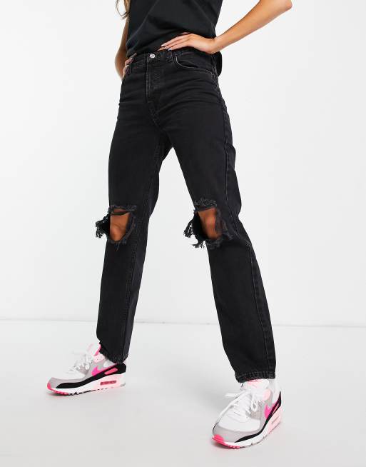 ASOS DESIGN - Jeans met rechte pijpen en lage taille in zwart met wassing en scheuren op de knie