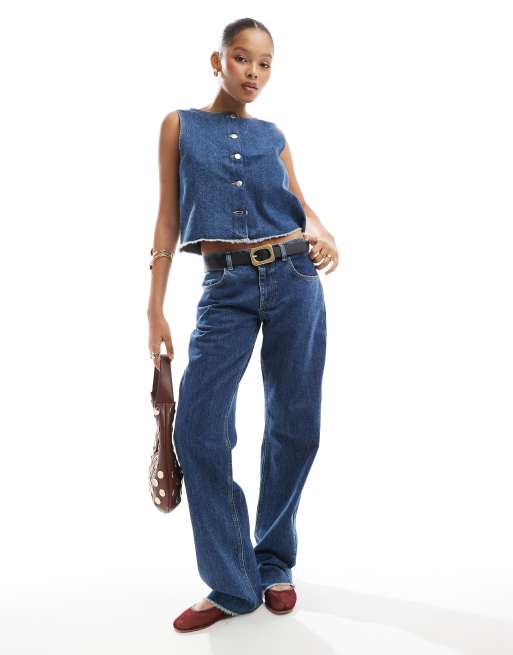 ASOS DESIGN - Jeans met ruwe zoom in middenblauw
