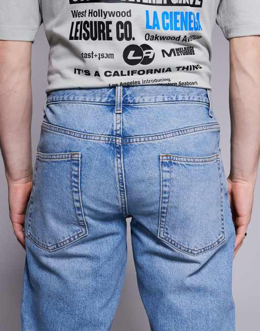 ASOS DESIGN - Jeans met smaltoelopende pasvorm in blauw met lichte wassing, 4 van 5