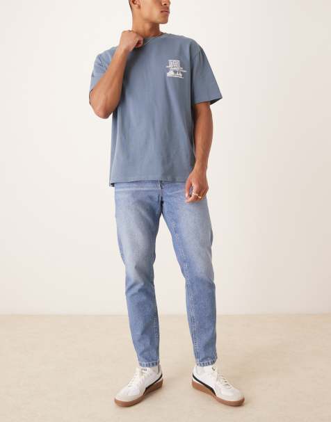 ASOS DESIGN - Jeans met smaltoelopende pasvorm in blauw met lichte wassing - view 1