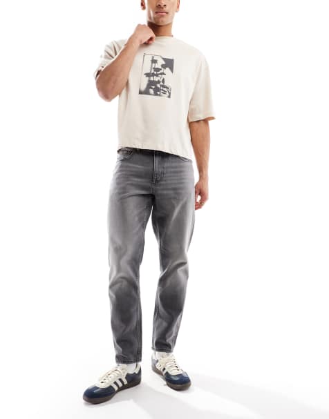 ASOS DESIGN - Jeans met smaltoelopende pasvorm in zwart met wassing - view 1