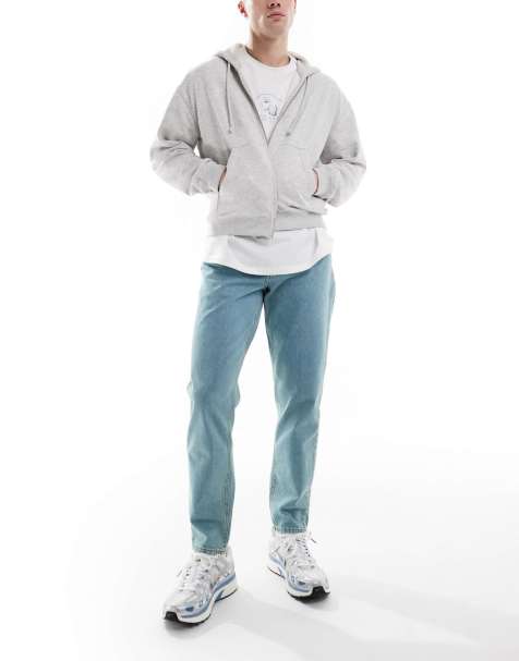 ASOS DESIGN - Jeans met smaltoelopende pijpen in blauw met getinte lichte wassing - view 1