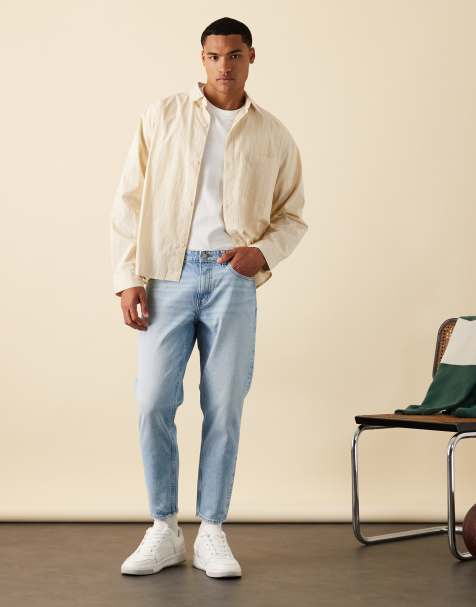ASOS DESIGN - Jeans met smaltoelopende pijpen in middenblauwe wassing - view 1
