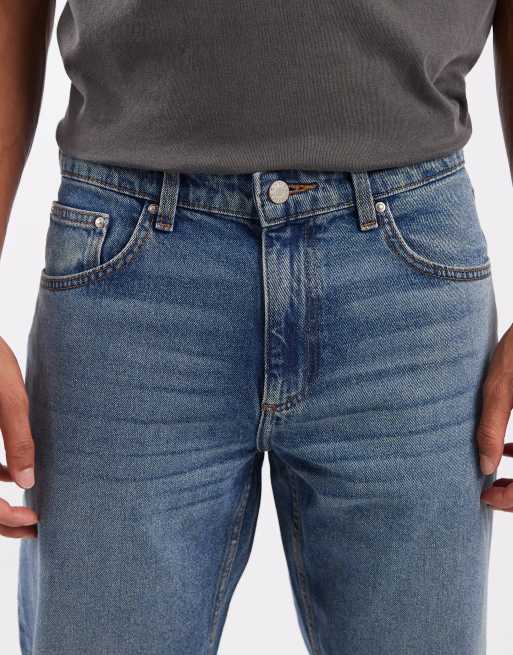 ASOS DESIGN - Jeans met smaltoelopende pijpen in middenblauwe wassing, 4 van 5