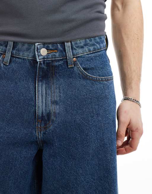ASOS DESIGN - Jeans met super wijde pijpen in mid-wash blauw, 4 van 5