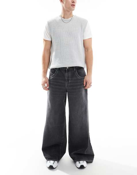ASOS DESIGN - Jeans met super wijde pijpen in zwart met wassing - view 1