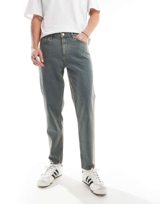 ASOS DESIGN - Jeans met toelopende pasvorm in vintage tint blauw