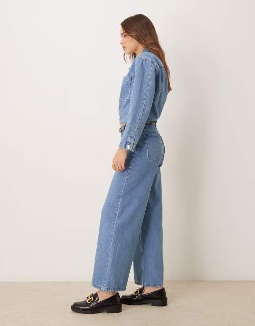 ASOS DESIGN - Jeans met wijde pijpen en lage taille in middenblauw, 2 van 5