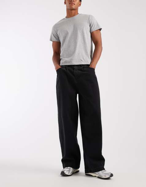 ASOS DESIGN - Jeans met wijde pijpen, plooien en riem in zwart met wassing - view 1