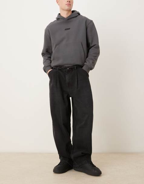 ASOS DESIGN - Jeans met wijde pijpen, plooien en riem in zwart - view 1