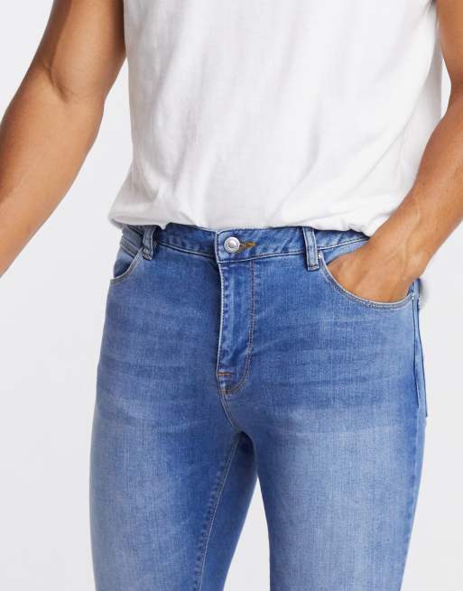 ASOS DESIGN - Jeans molto corti power stretch effetto spray blu medio con orlo grezzo, 3 di 4