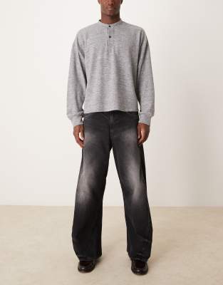 ASOS DESIGN - Jeans nero slavato con cuciture attorcigliate - view 1